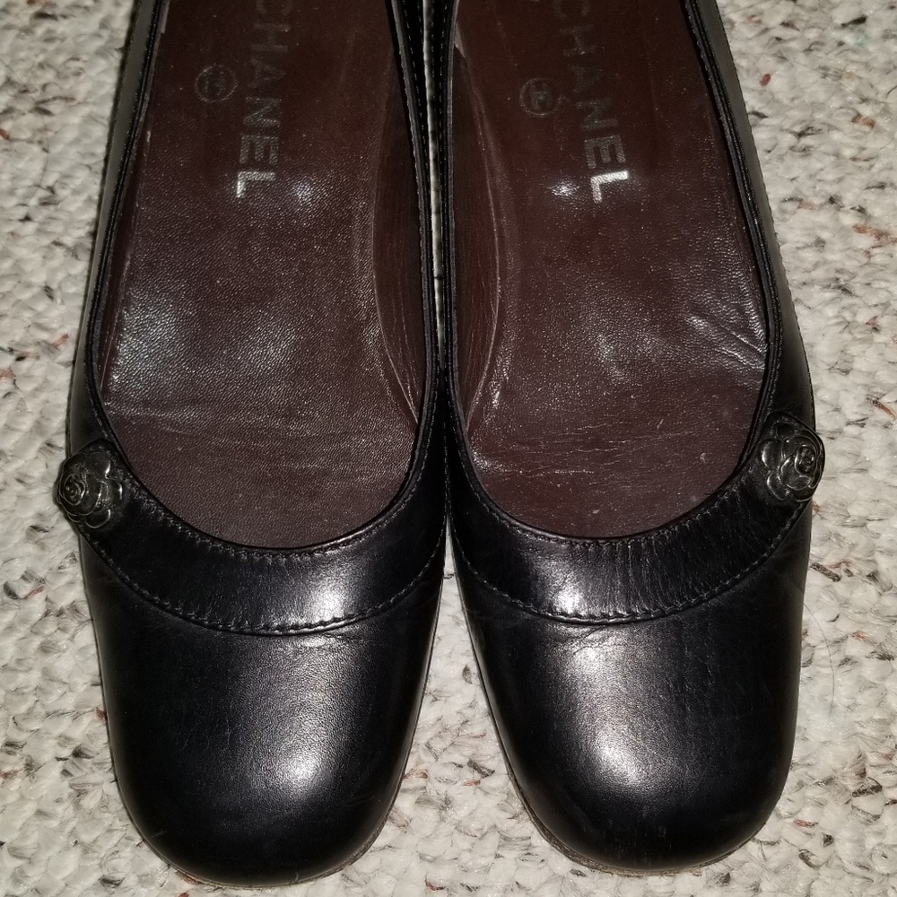 Chanel black flats w/ camellia flower detailing
